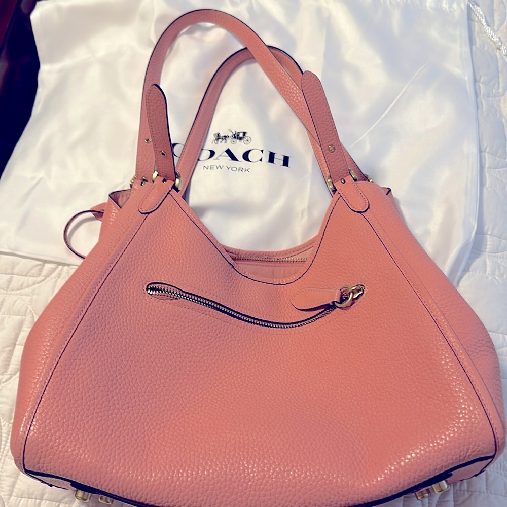 Pink Coach shoulder handbag. Perfect condition-no scratches or marks.